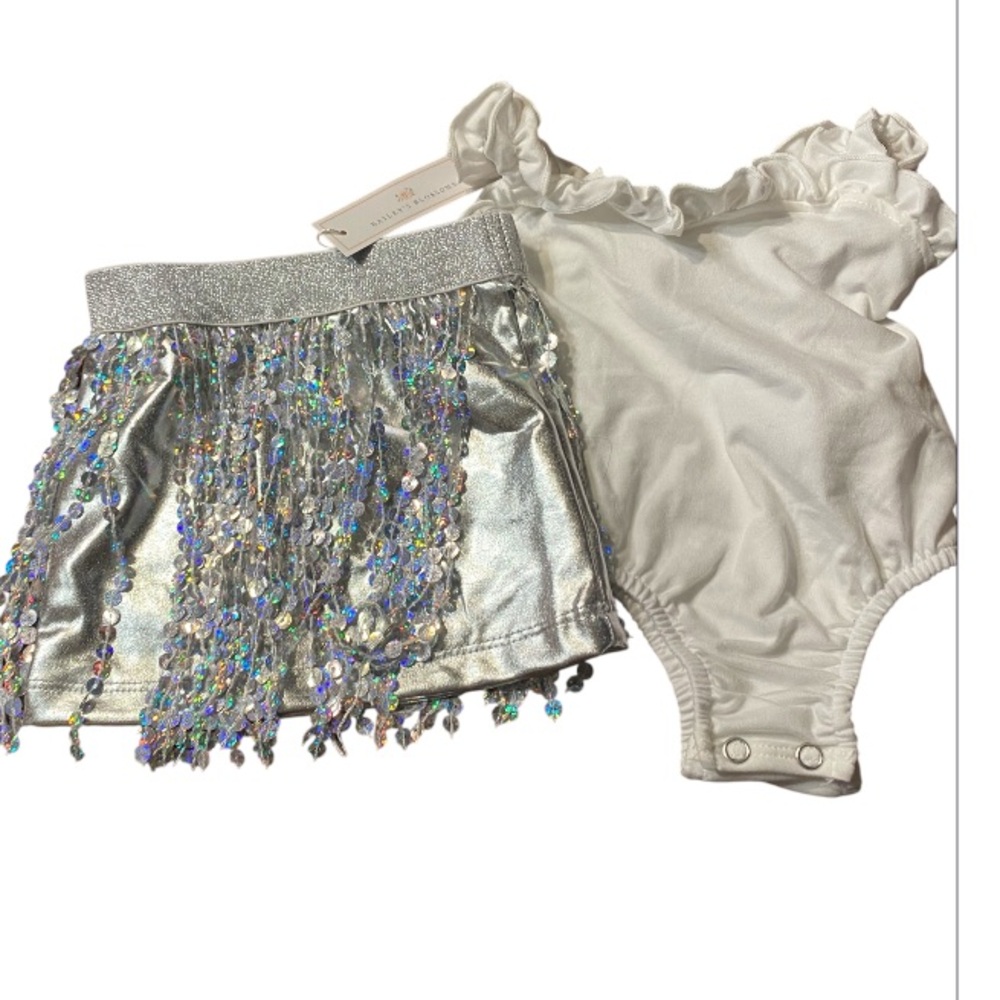 Bailey’s Blossom White ruffled top with Sequin Skirt. Size 3–6 months.